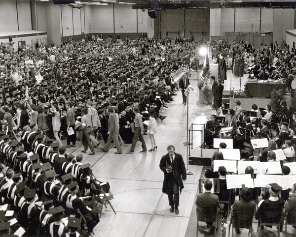 Protesters walk out during Nelson D. Rockefeller's commencement speech.