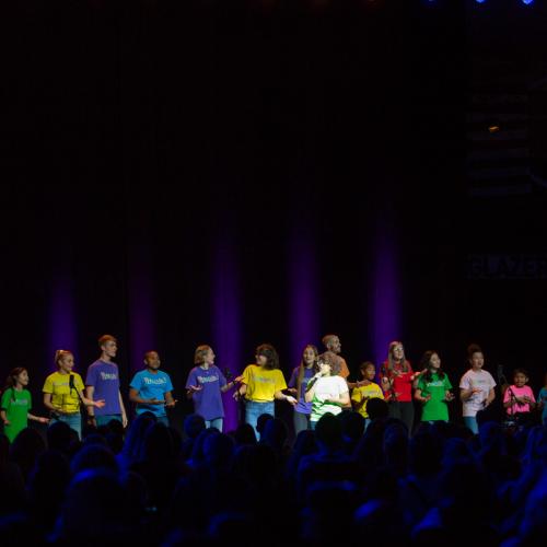 Vitamin L singers on stage. 